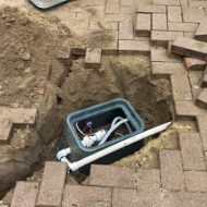 Bore drilled in driveway under paving